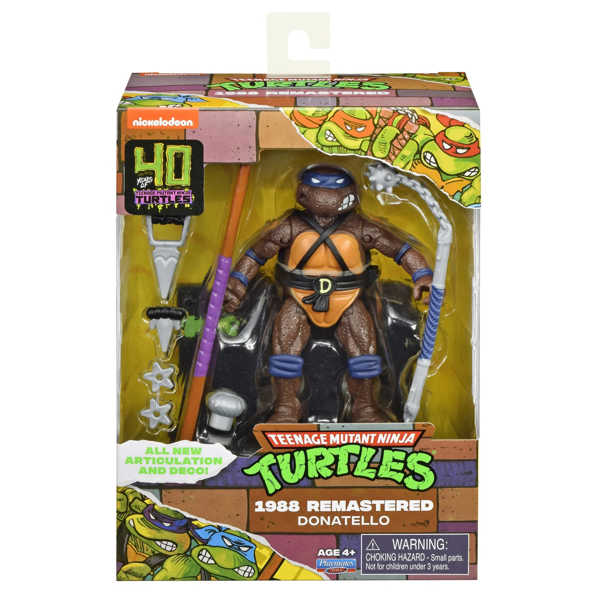 Front of the boxed purple-masked turtle figure with bo staff and flail