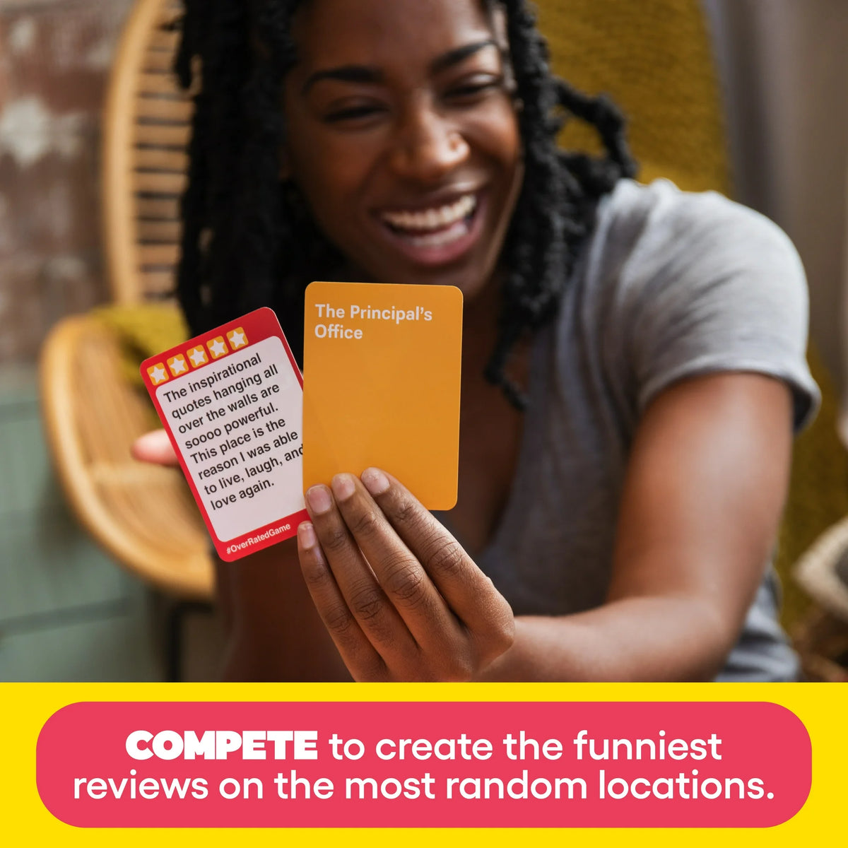 Laughing woman holding a five-star review card and a Principal's Office location card
