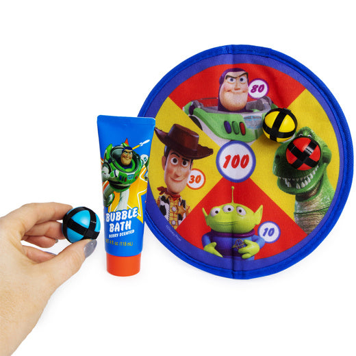 Round Toy Story dart board, berry bubble bath tube and hand holding a sticky ball