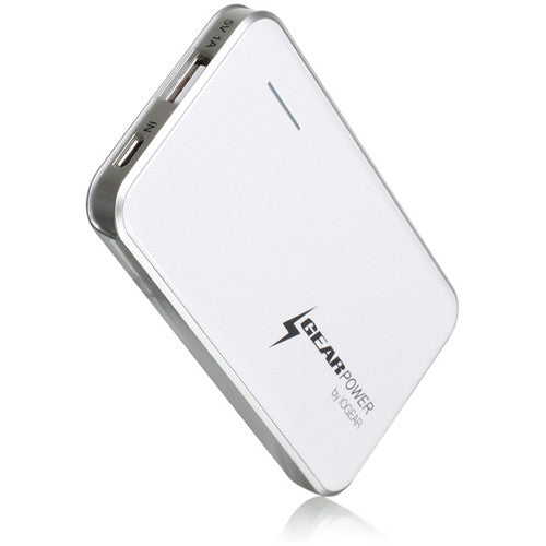 White power bank standing on its side with ports on the top edge
