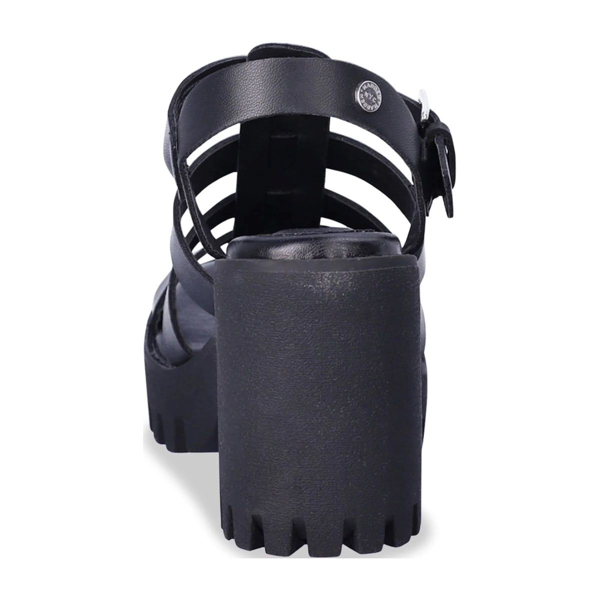 Back of a black fisherman sandal with a chunky lug-sole block heel
