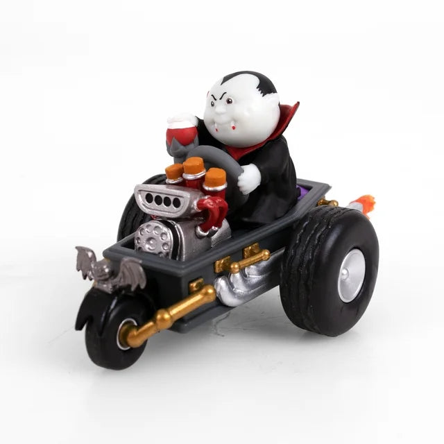 Coffin hot rod figure from the other side with chrome engine and red pipes