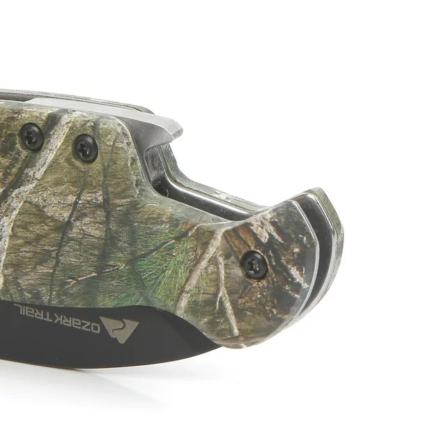 Close-up of the camo handle's built-in bottle opener and steel liner