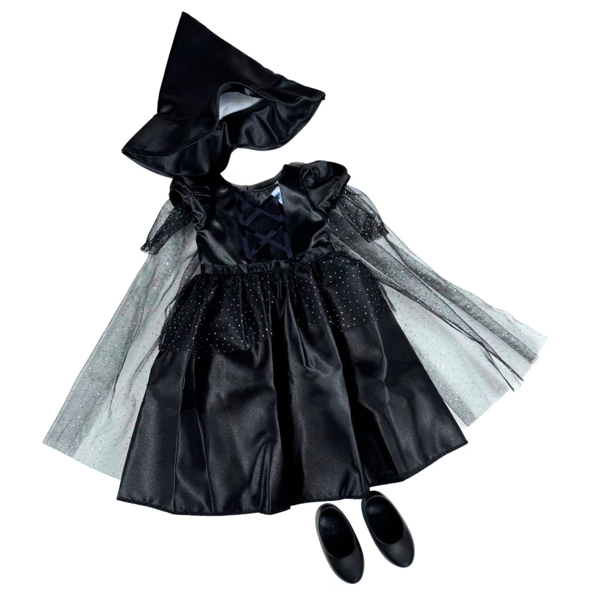 Black satin doll dress with sparkly tulle sleeves and cape, pointed witch hat and black shoes