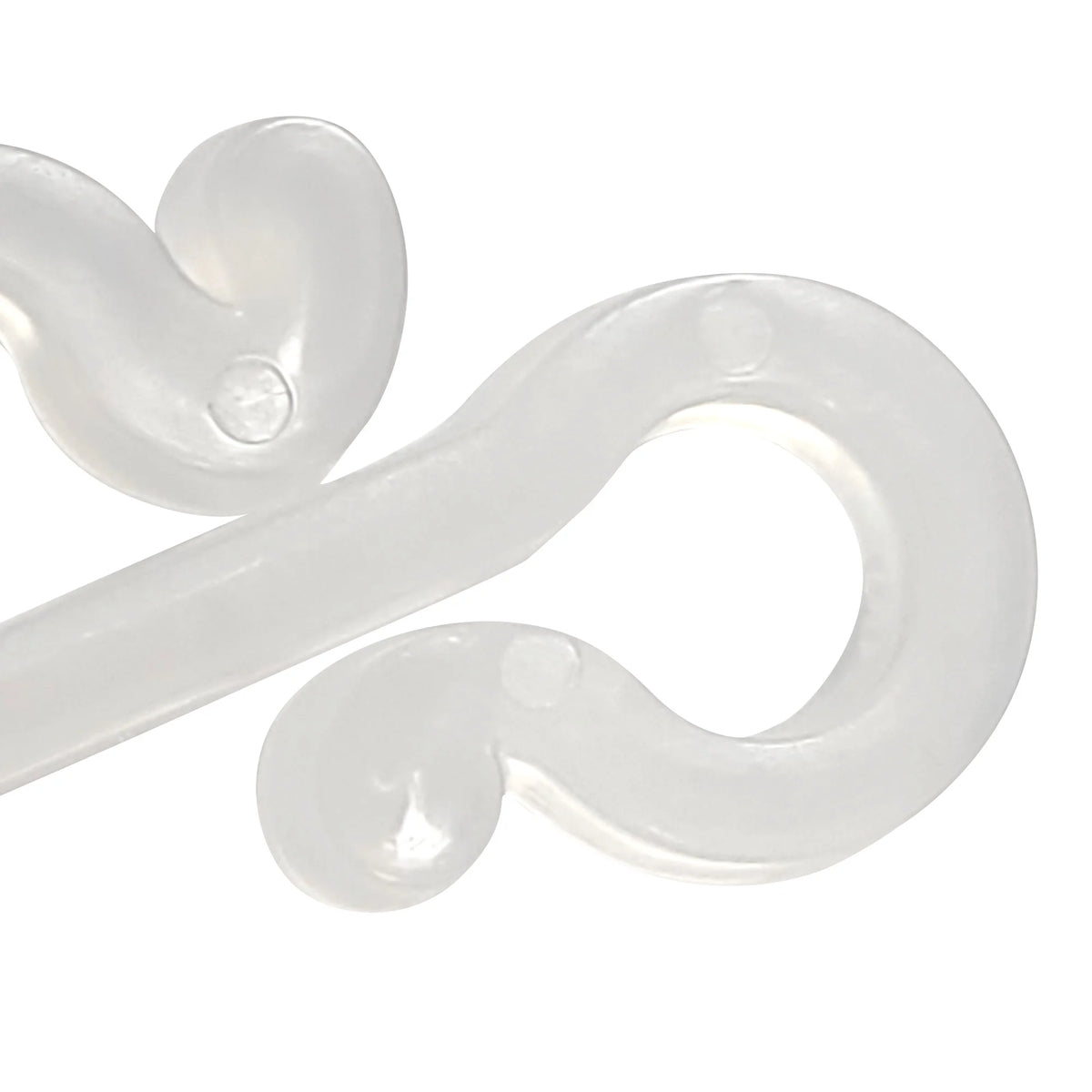 Extreme close-up of the frosted clear hook loop and curled tabs