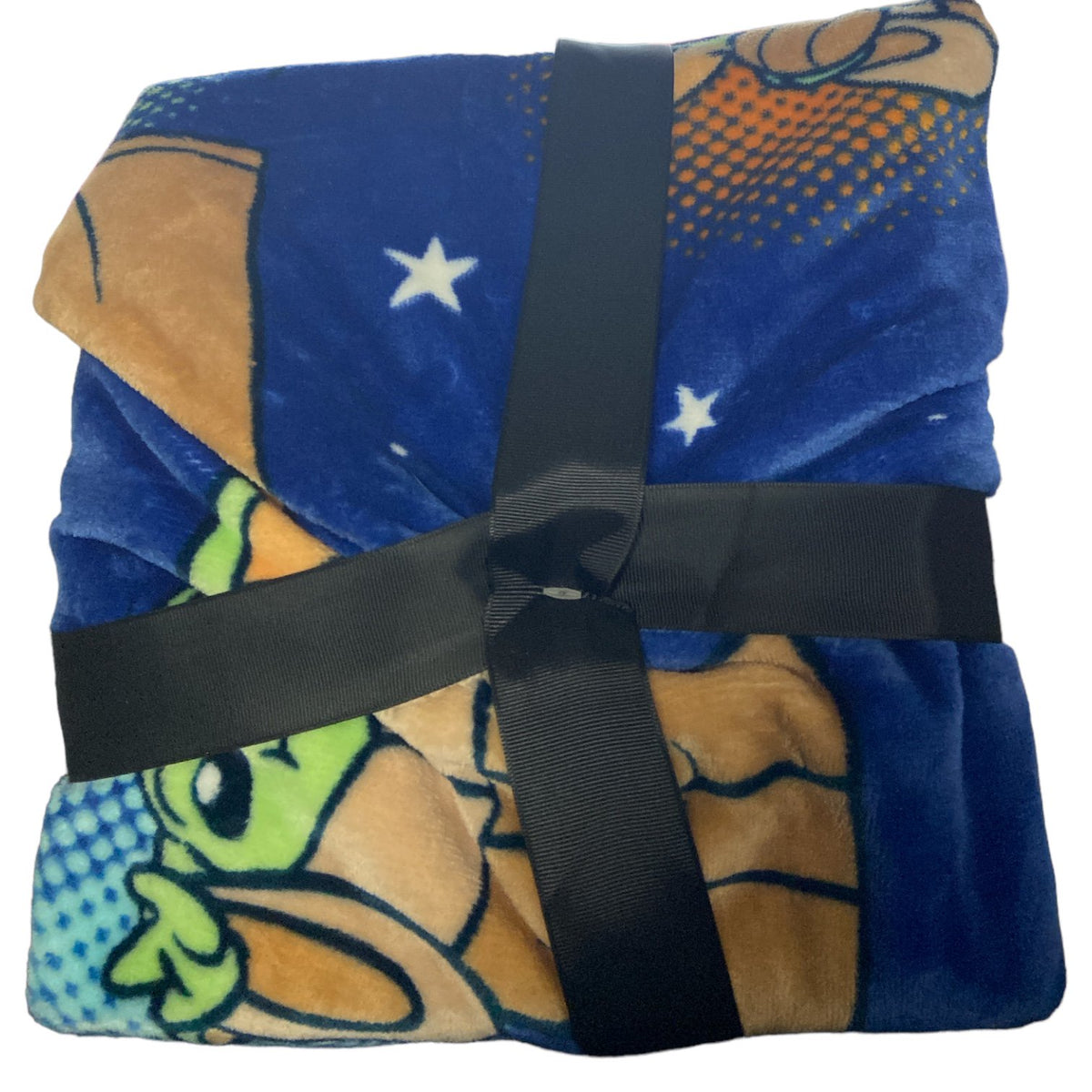 Rolled blue fleece blanket with Grogu print tied with a black ribbon