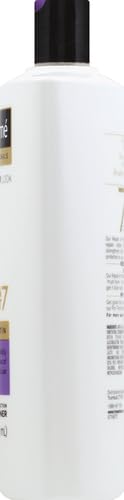 Narrow side view of the white conditioner bottle