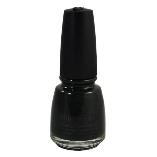 Black-green nail polish bottle in soft light, side-on view