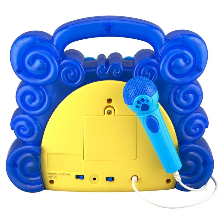 Back of the blue boombox with yellow battery panel, switches and microphone jack