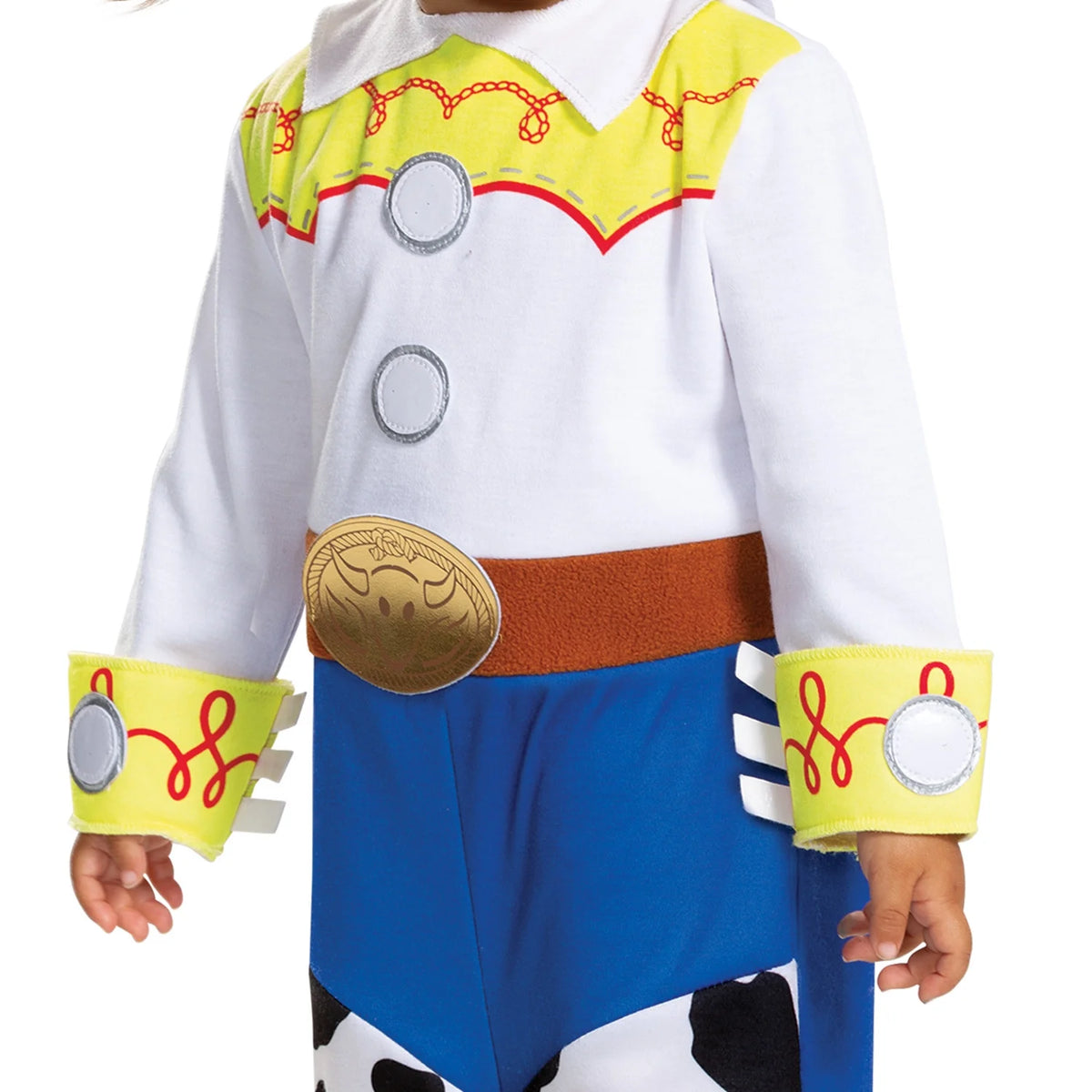 Close-up of the jumpsuit's yellow cuffs, white buttons, brown belt and gold buckle