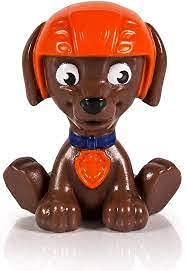 Tiny brown pup figure with an orange helmet sitting on a white background