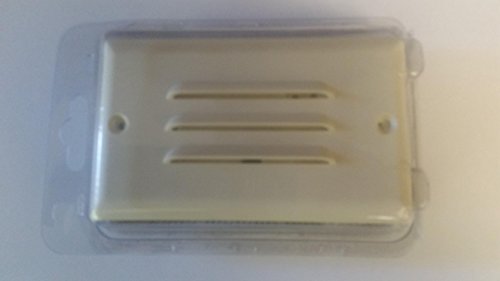 Almond louvred step light plate in a clear blister pack