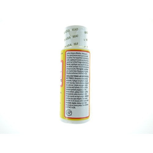 Side of the decoupage medium bottle with Spanish and French usage text