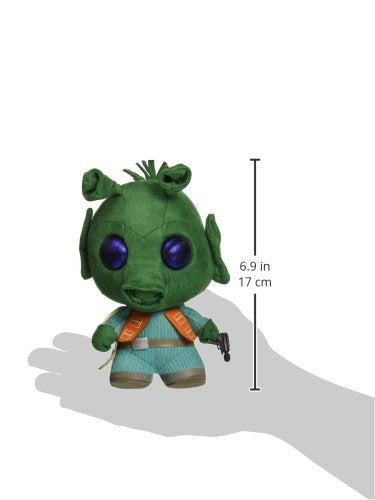 Size guide showing the green alien plush in a hand, 6.9 inches tall