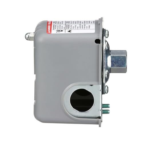 Side of the grey pressure switch showing the 1/4 inch pipe fitting and conduit hole