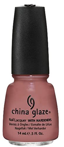 Bottle of dusty rose mauve creme nail lacquer with a black cap