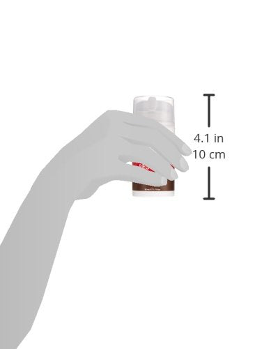 Size guide showing the night creme pump bottle in a hand, 4.1 inches tall