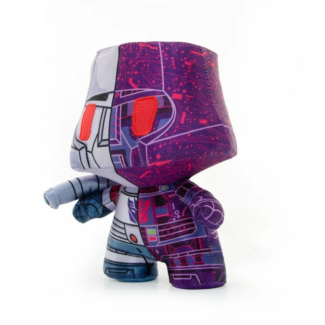 Side view of the Megatron plush showing the purple circuit half