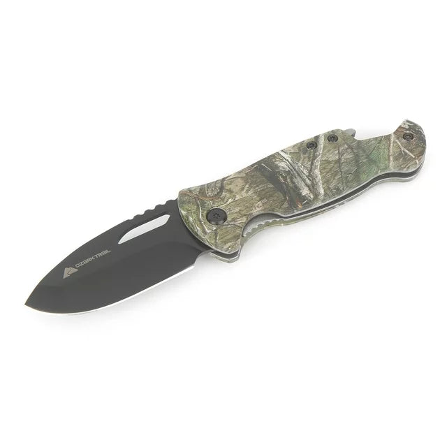 Camo folding knife open at an angle, showing the blade cut-out and bottle opener