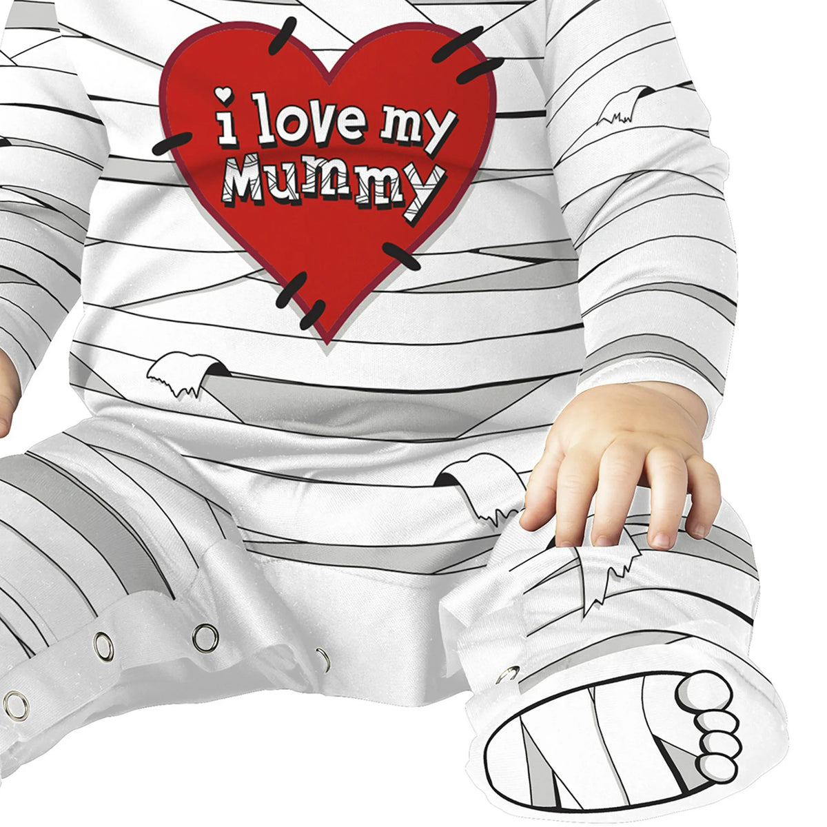 Baby in a white bandage-print footed jumpsuit with a red I love my Mummy heart