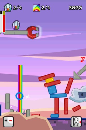 Game screen with a red magnet, rainbow beam and a stack of red and blue blocks