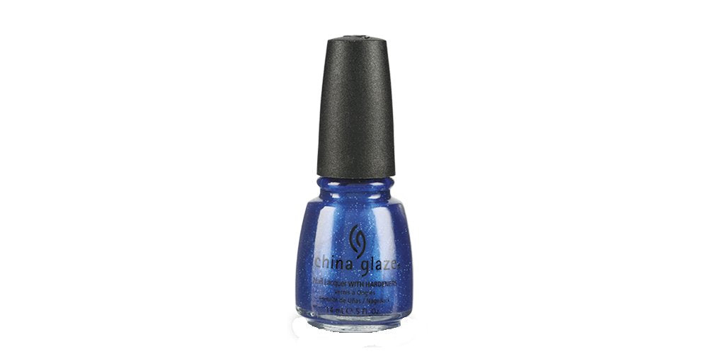 Bottle of royal blue nail lacquer with silver sparkle