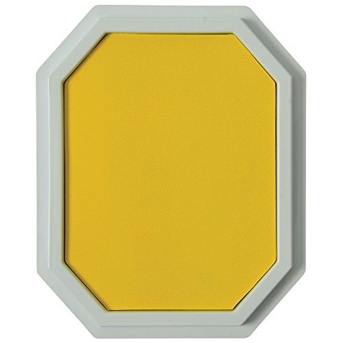 Top view of the yellow ink stamp pad in a grey octagonal tray