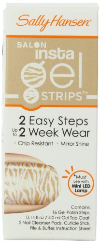 Front of the beige box with a gold and white zebra print nail, mini LED lamp needed