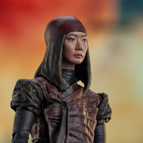 Close-up of the warrior figure's face with red headscarf and long dark hair