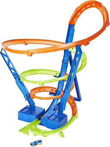 Built orange, green and blue spiral car track with loops on two blue booster bases