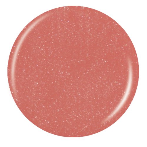 Round swatch of coral pink polish with fine silver sparkle