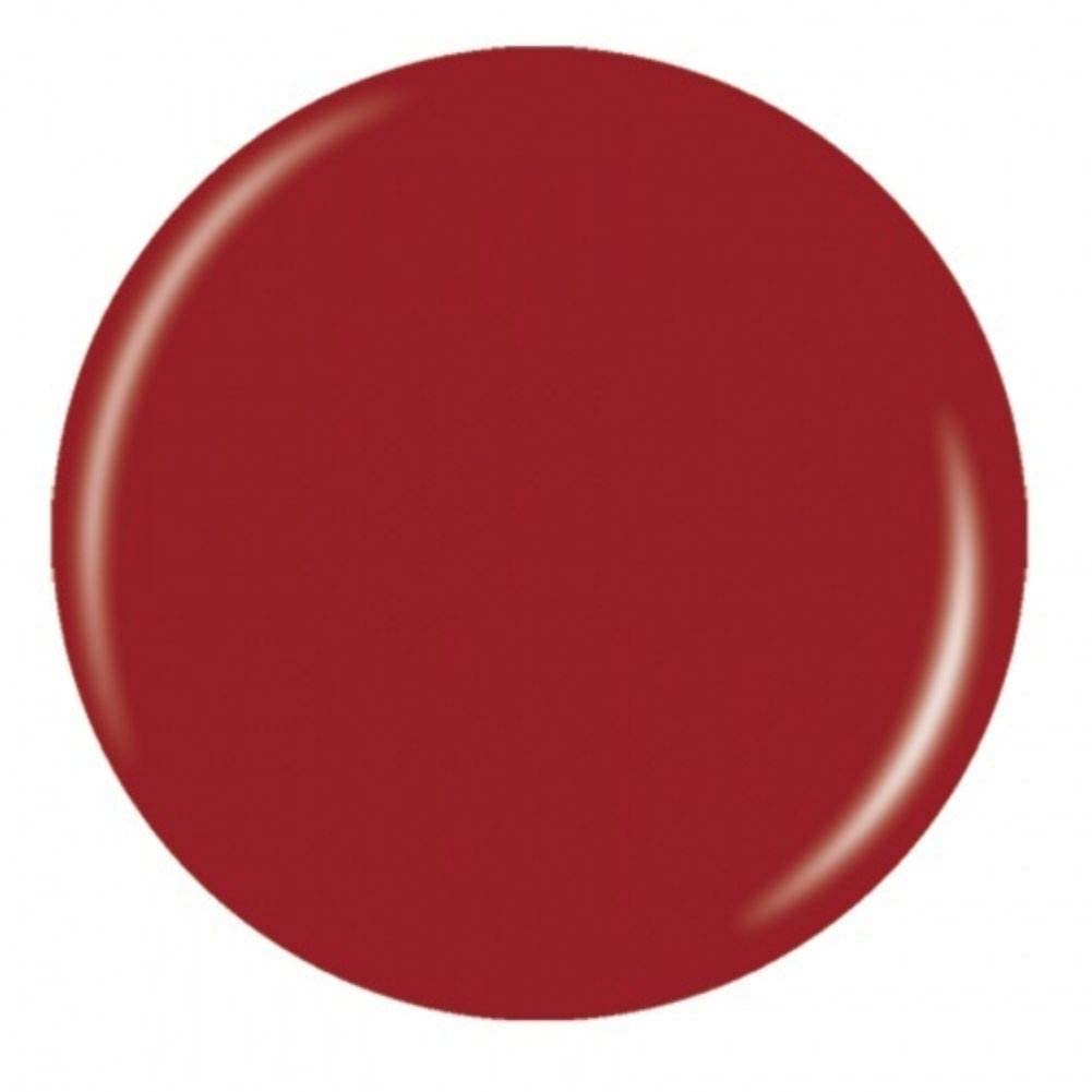 Round swatch of glossy brick red creme nail polish