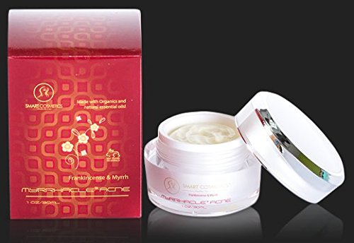 Myrrhacle Acne frankincense and myrrh cream jar open beside its red gift box