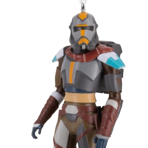Close-up of the soldier ornament's orange-striped helmet and teal shoulder pads