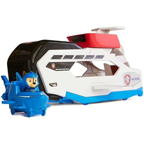 Blue shark sub with pup figure in front of the white and black whale vehicle