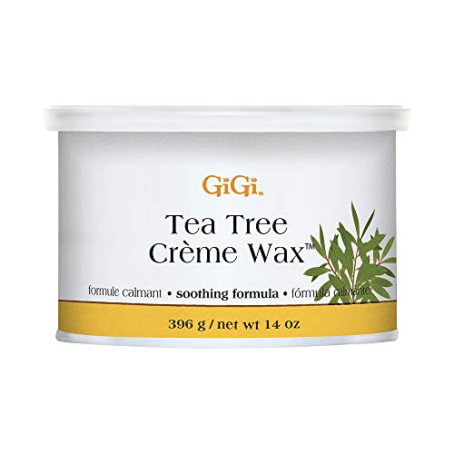 White 14 oz tin of tea tree creme wax with a green sprig on the label