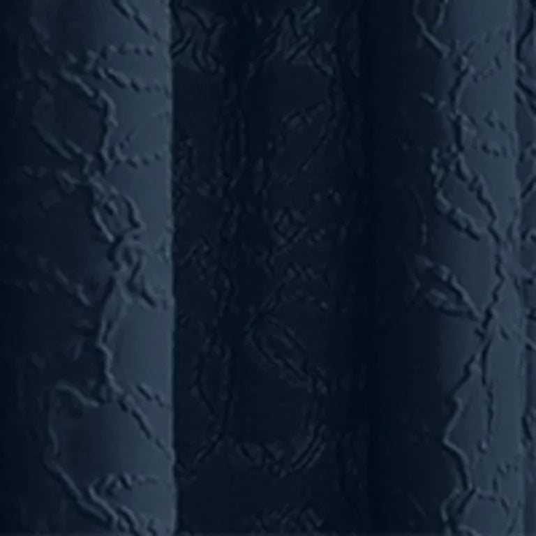 Dark close-up of the navy microsculpt floral fabric