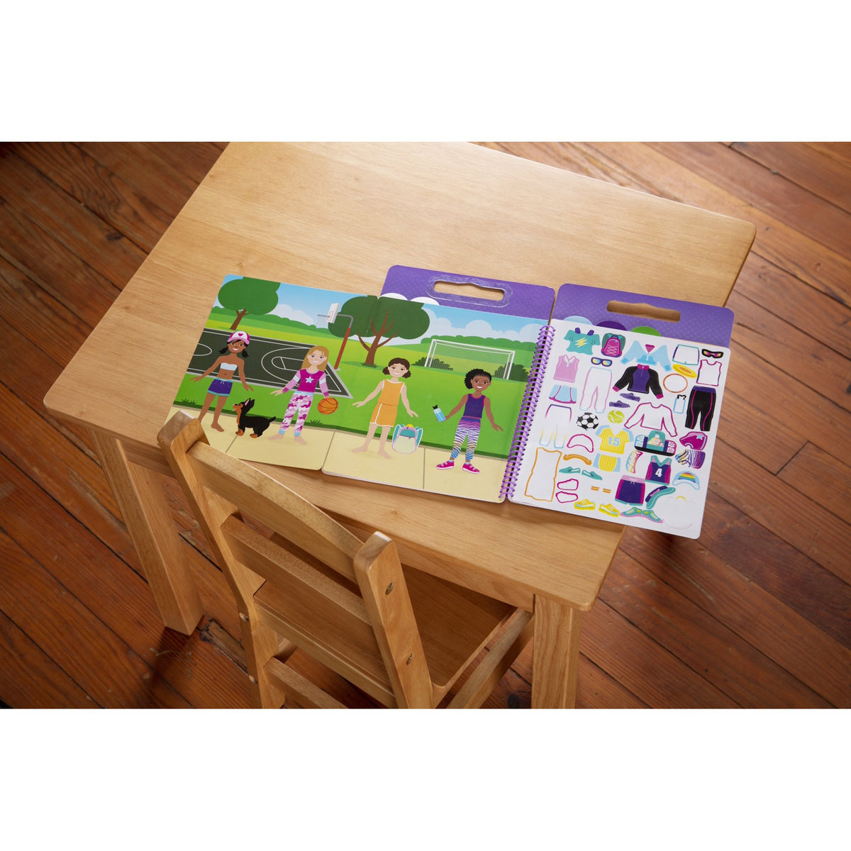 Park sports scene dressed in sticker outfits on a wooden table