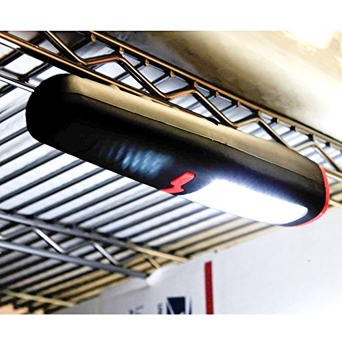 LED work light hanging lit beneath a wire shelf