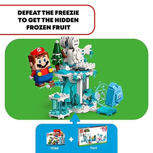 Mario figure jumping at the snowy tower with Freezie hiding the frozen fruit