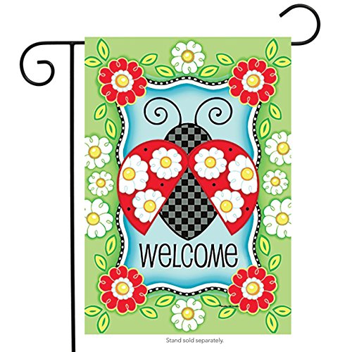 Green garden flag with a checkered ladybug with daisy spots, flower border and Welcome, on a stand