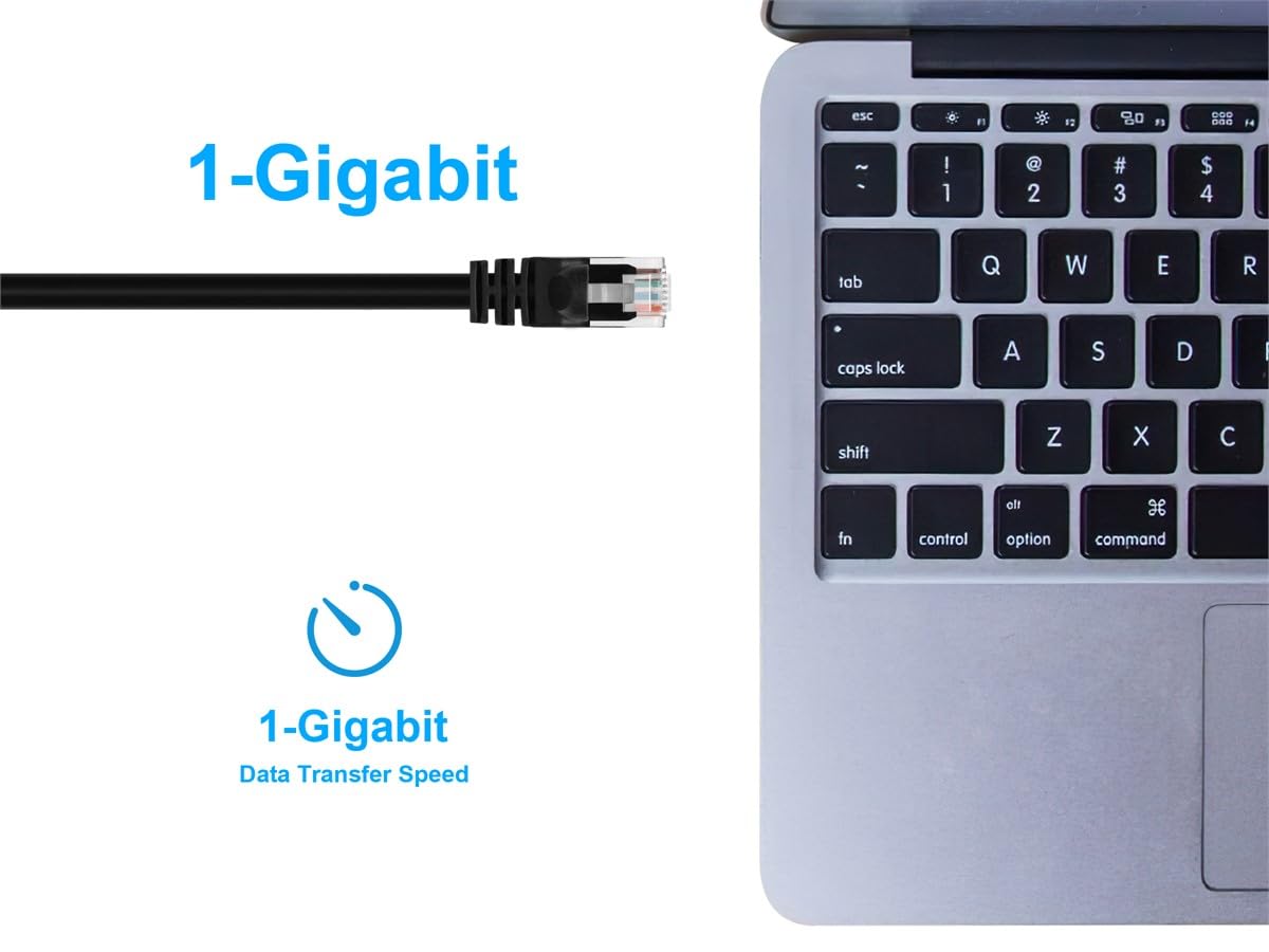 Black ethernet cable end next to a laptop keyboard, 1 gigabit speed