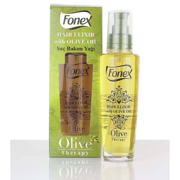 Clear pump bottle of olive oil hair elixir beside its green olive therapy box