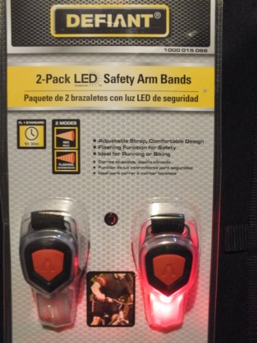 Two-pack LED safety arm bands on a yellow and silver card with a lit red light