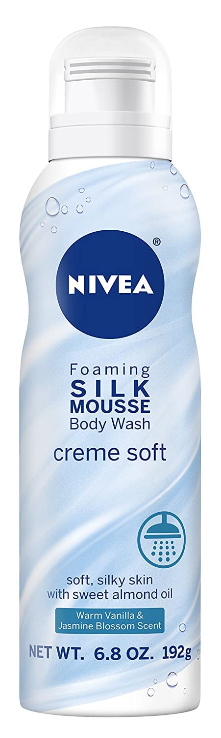 Light blue 6.8 oz can of foaming mousse body wash, warm vanilla and jasmine scent