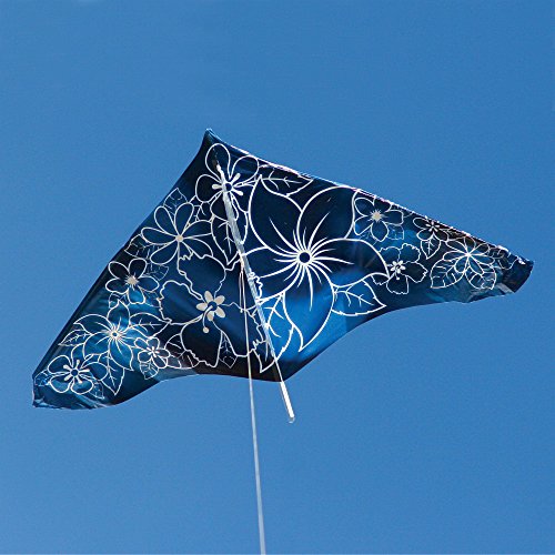 Navy hibiscus print delta kite flying in a clear blue sky