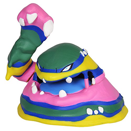Pink, green, blue and yellow striped Muk figure with an arm raised