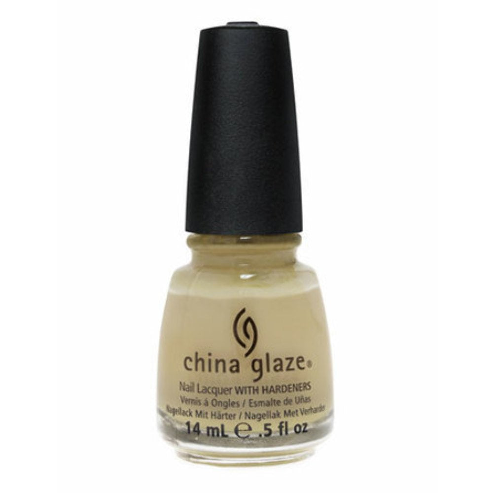 Bottle of pale beige nude creme nail lacquer with a black cap