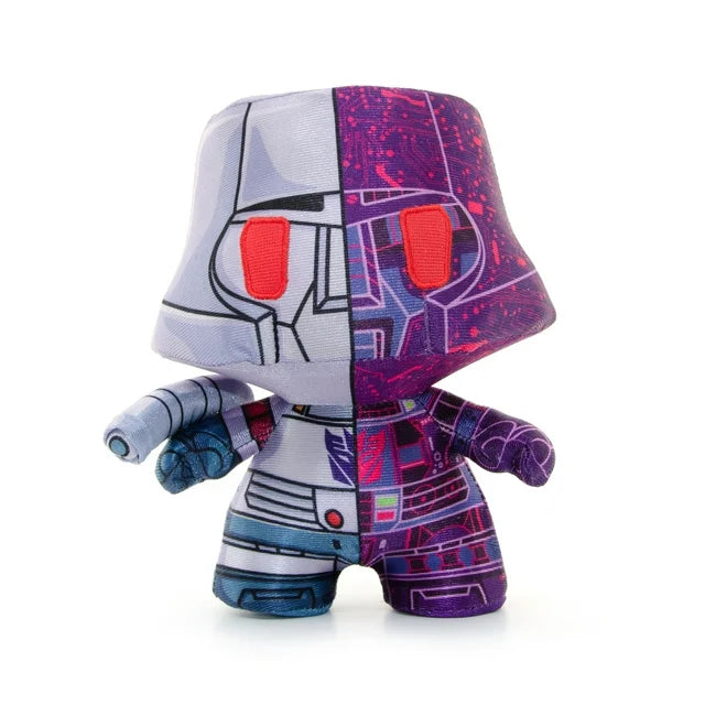 Front view of the Megatron plush with red eyes and arm cannon