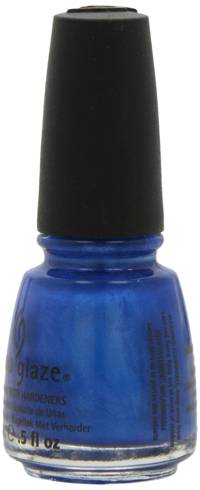 Cobalt blue polish bottle from the left side with warning text